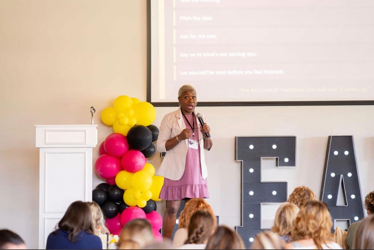 Aileen M. Edwards speaking on stage